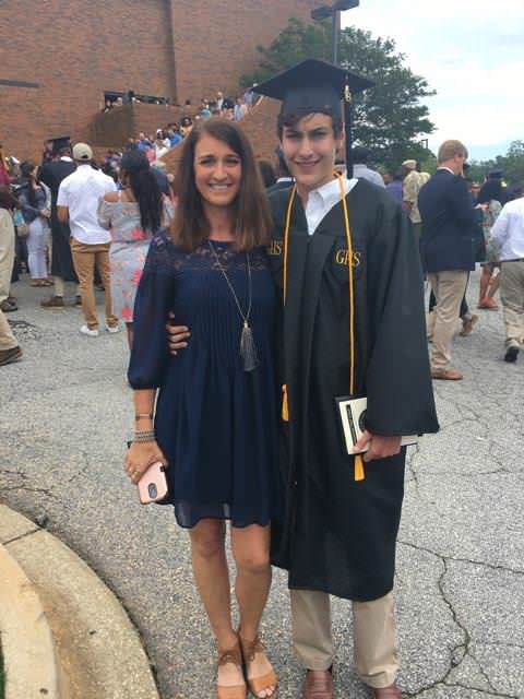 Grey at his high school graduation with mom Cindy