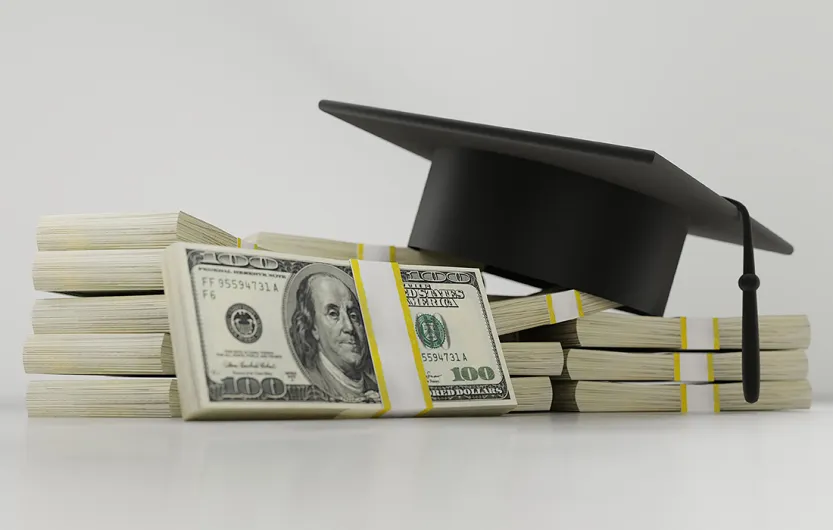 grad cap and money