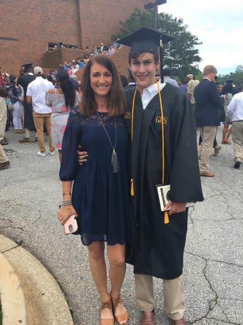 Grey at his high school graduation with mom Cindy