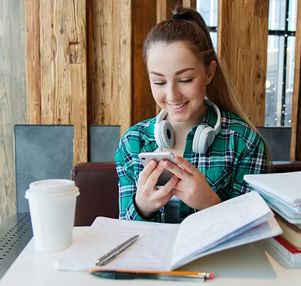 Girl face-timing and studying