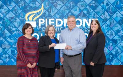 Group presenting a check