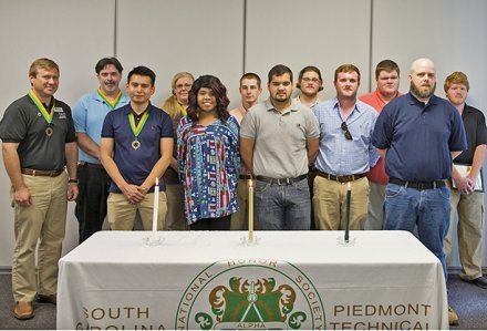 tau alpha pi induction