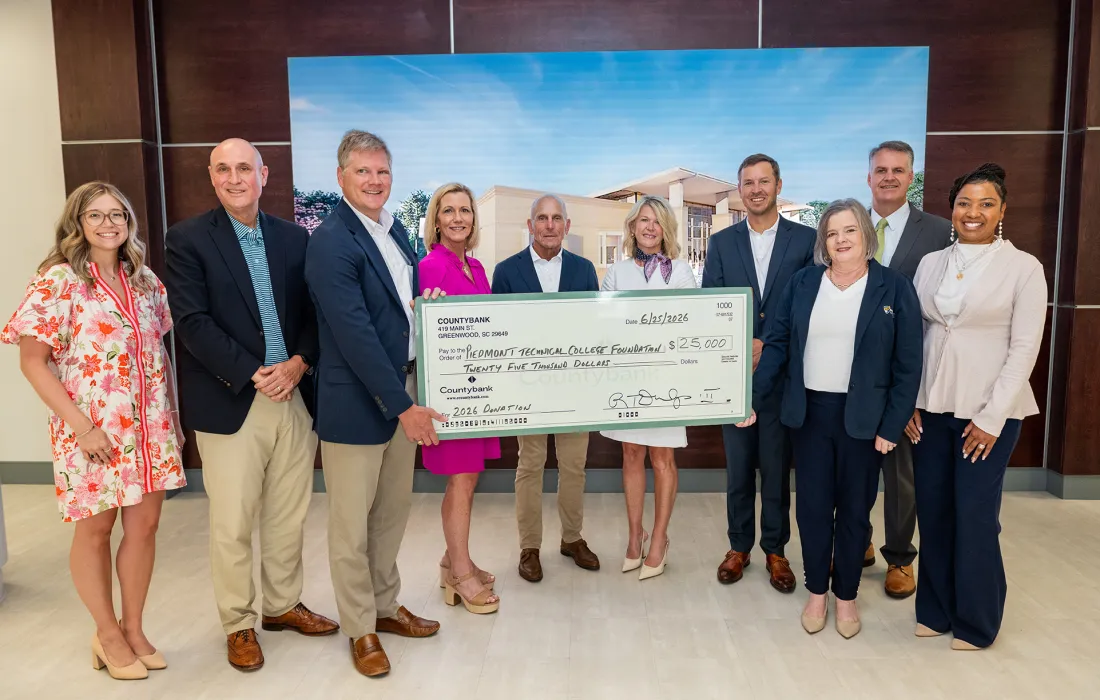 Group presenting a check