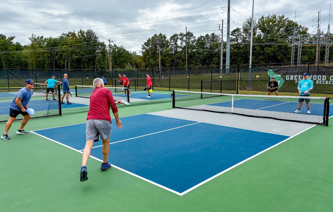 Group playing pickleball