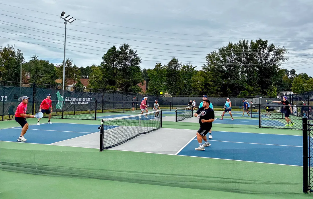 Men playing pickleball