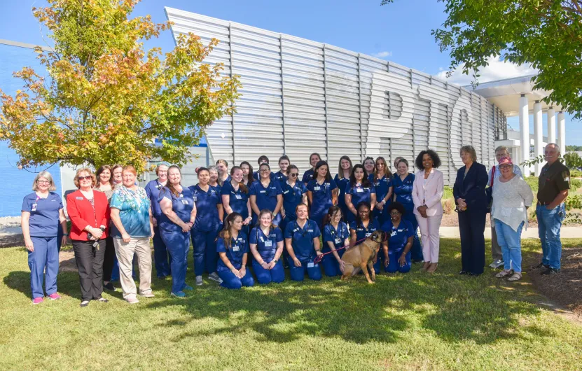 Bull Mastiff Charleigh joins PTC students, instructors, and benefactors