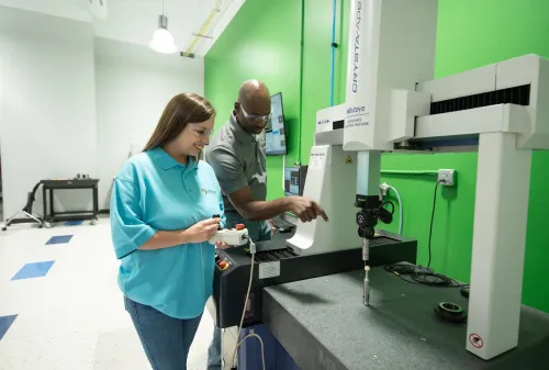 Advanced manufacturing student and faculty member